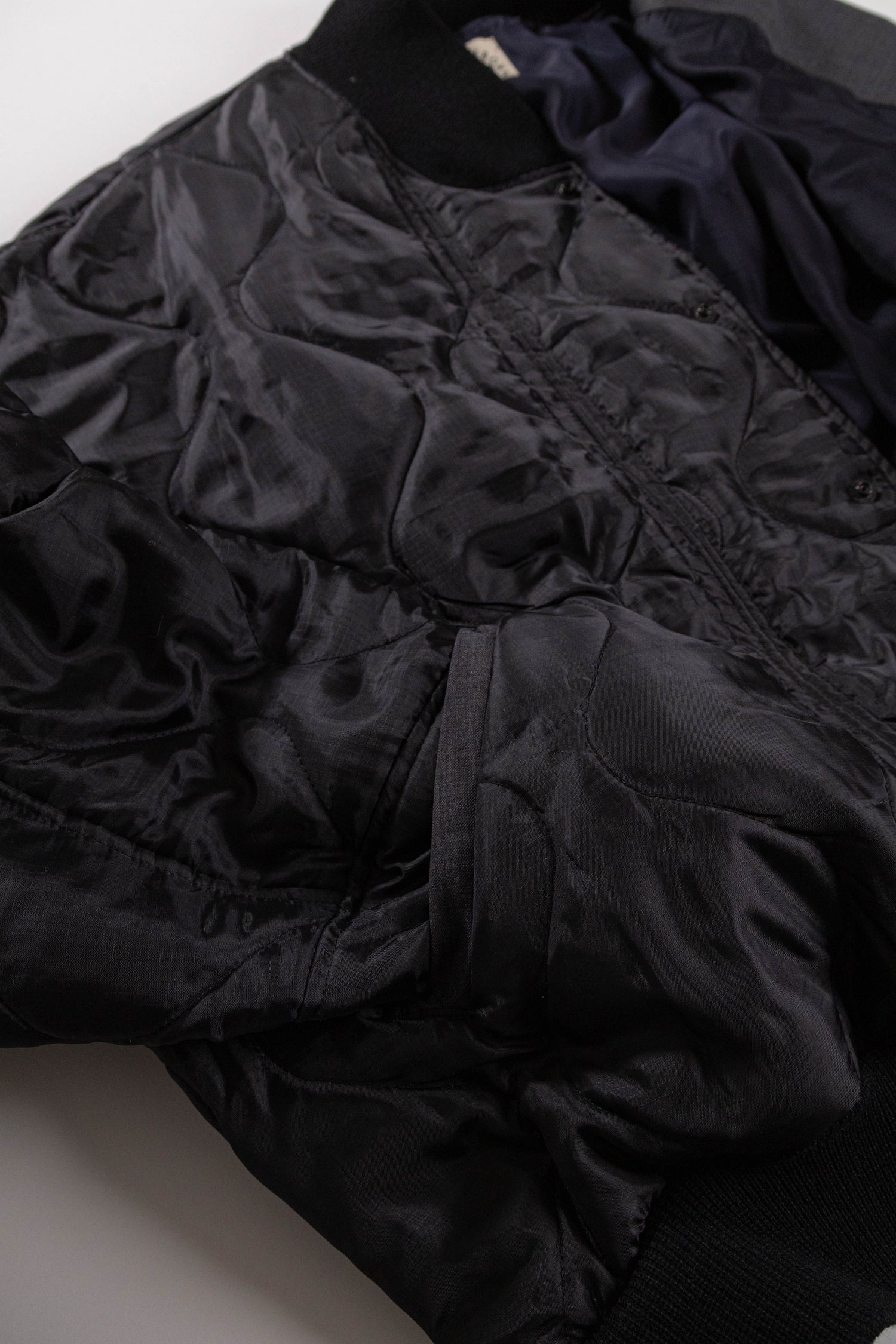 【REMAKEBYK×StyleReborn】Remake Quilting Stadium Jumper Black